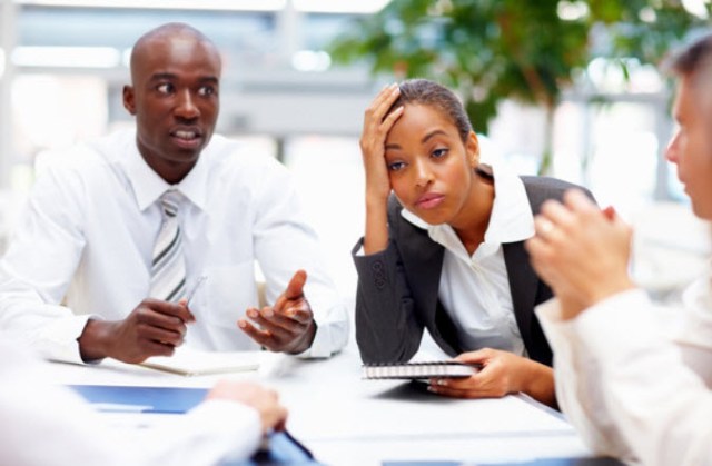 photodune-182656-unhappy-business-team-at-a-meeting-xs